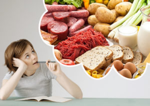 A person imagining food ingredients while biting on a pen