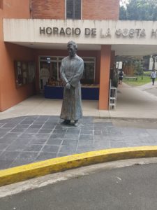 A statue in front of the Horacio De La Costa Hall in Ateneo