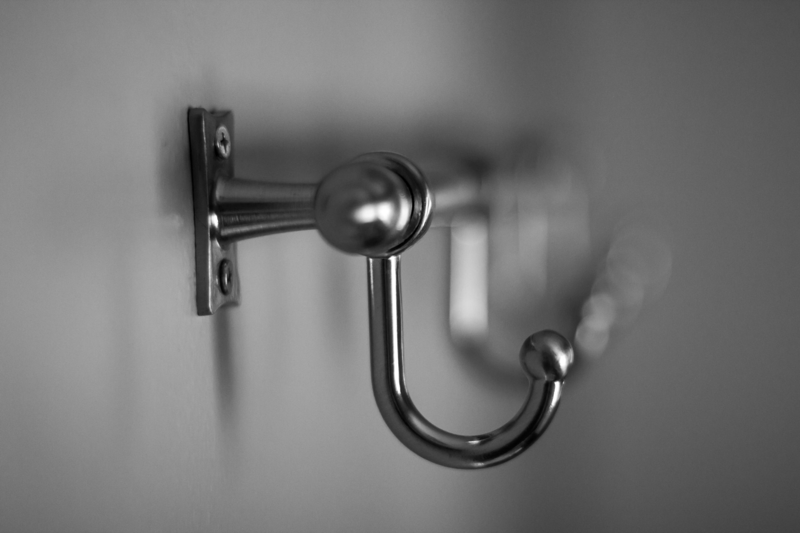 A row of bolted coat hangers