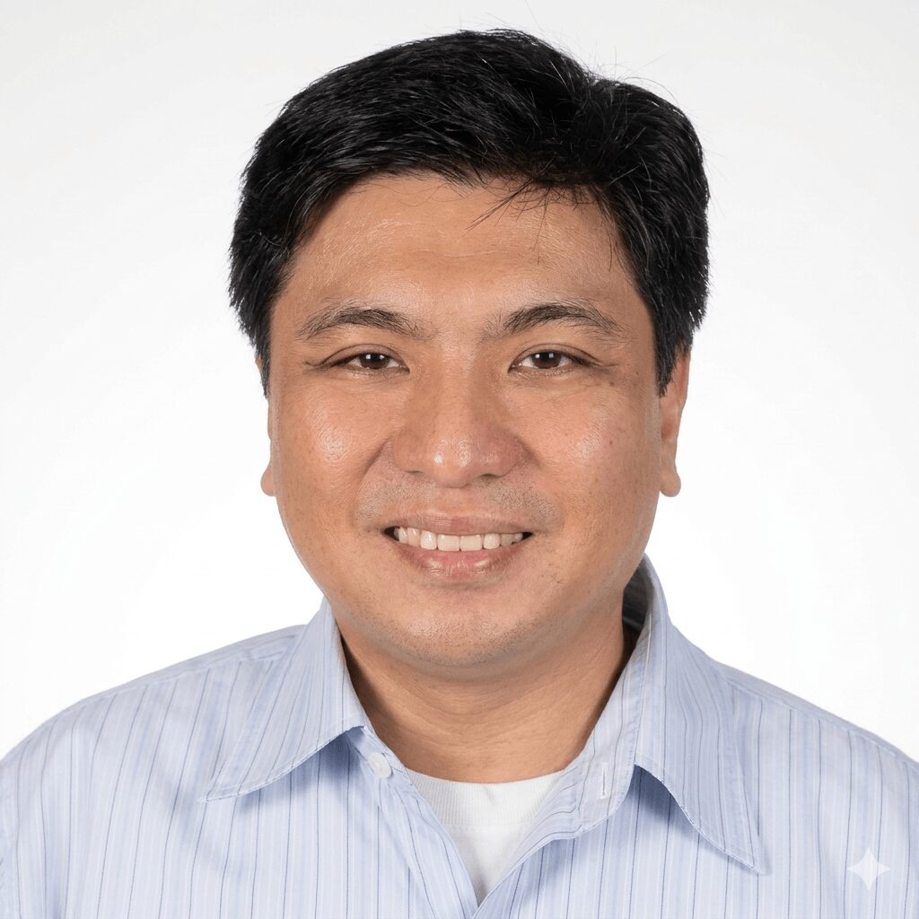A headshot picture of a smiling person