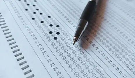 Exam paper with a pen