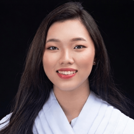 A headshot picture of a smiling person